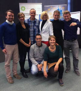 Our team and the judges/mentors. Our team and the judges/mentors.